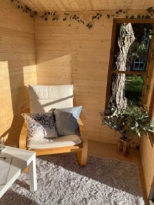 Inside The Counselling Cabin, Ravenshead - comfy chair and views to the garden