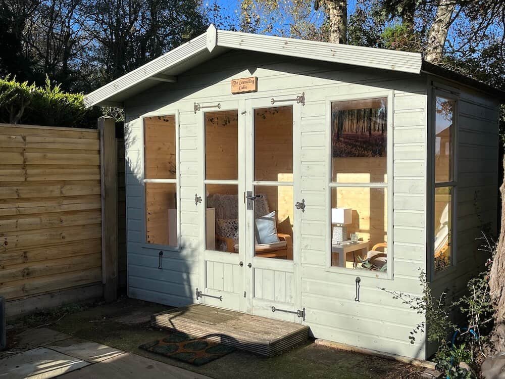 Exterior of The Counselling Cabin, Ravenshead - garden counselling room with windows